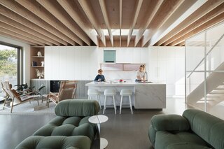 In the main living spaces, Montgomery exposed the Douglas fir LVLs, which are structural support beams that span the entire ceiling and don’t necessitate support columns.