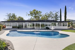 Is it or isn’t it by the modern master? We figured it out after architects Erik Amir and Dora Chi pulled off a reverent revamp.
