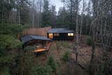 The Only Way Through This Cabin in Chile Is Up Its Narrow “Backbone”