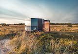 This $32K Backyard Prefab Office Features Walls of Windows