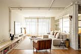 Creamy Tile Polishes Up a Brazil Apartment’s Rough Concrete Edges