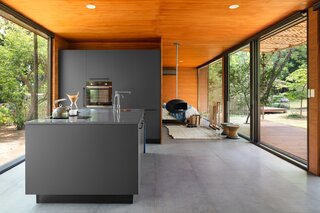 The cabinetry is fabricated by a local Indian craftsman styled in the manner of modern German and Italian kitchens at a fraction of the cost.