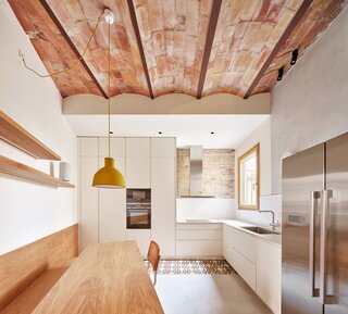 The focus of the renovation was the kitchen, where the textures of tiles and brickwork play backdrop to considered, bespoke carpentry.